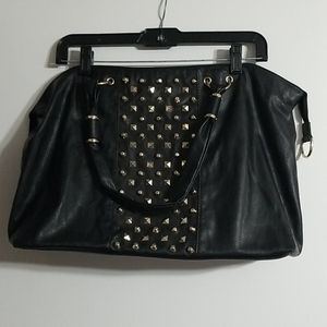 large black studded purse